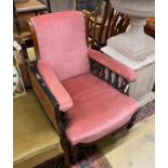 A late Victorian upholstered walnut open armchair, width 68cm, depth 84cm, height 90cm