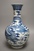 A Chinese blue and white 'dragon' bottle neck vase, 39.5cm tall