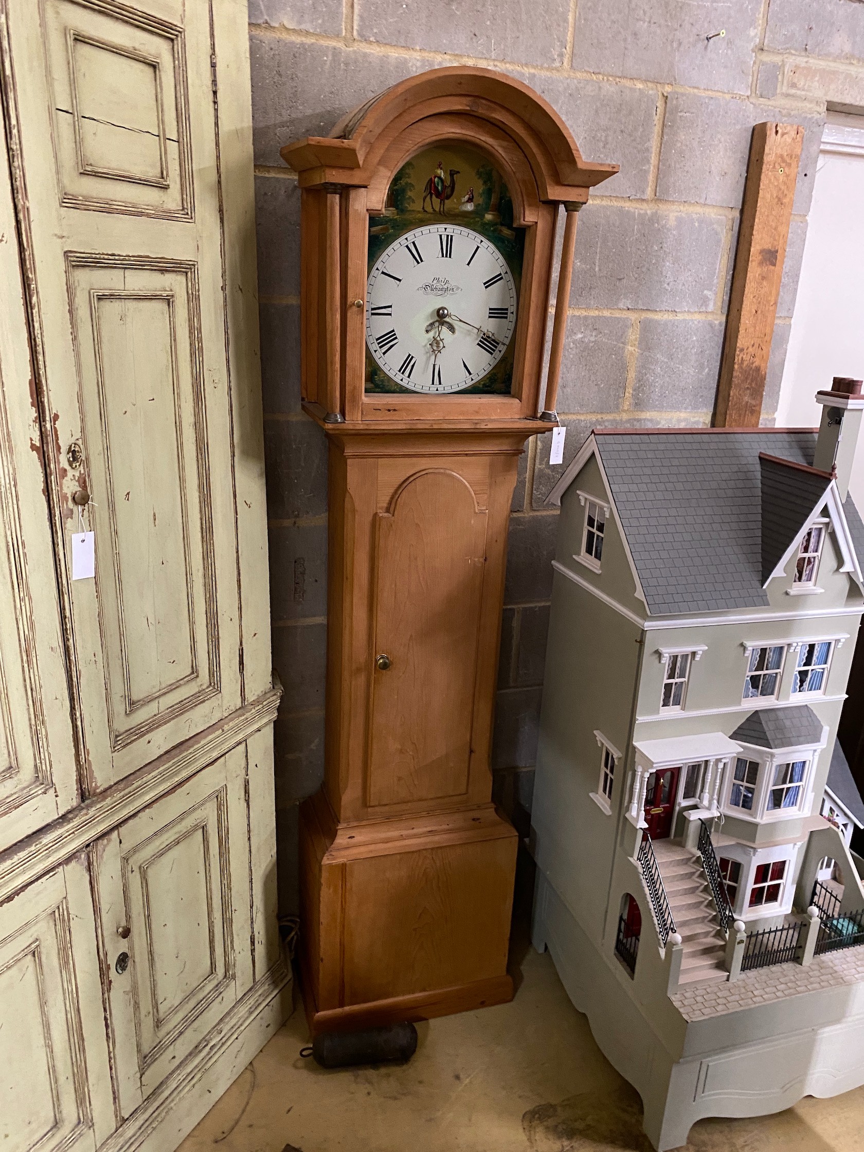 A Victorian pine 30 hour longcase clock marked Philp, Okehampton, height 195cm