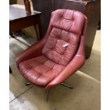 H.W. Klein for Bramin. A Danish burgundy leather swivel chair, width 76cm, depth 84cm, height 88cm