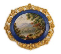 A 19th century Italian gold mounted micro-mosaic oval brooch, depicting a countryside scene, 54mm,