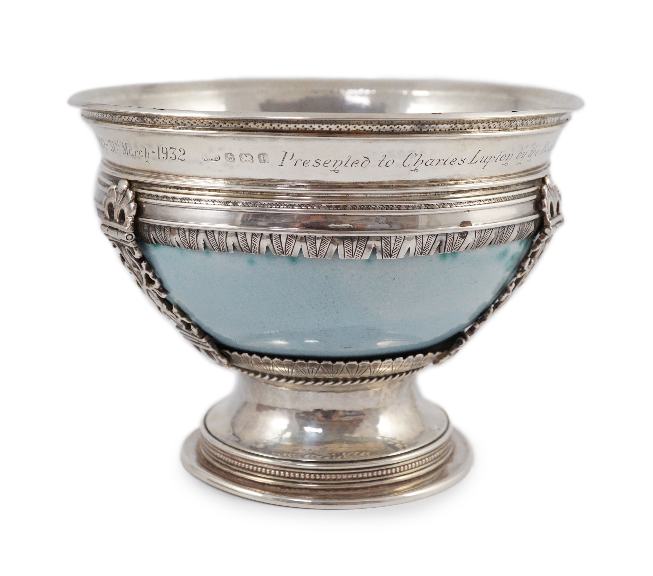An Arts and Crafts silver mounted Ruskin pottery pedestal bowl, the silver mounts by A.E. Jones,