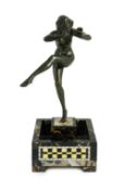 Pierre Le Faguays (1892-1962). An Art Deco bronze figure of a female pan piper, standing holding one