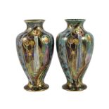 N.B. RESTORATION TO ONE VASE A pair of Wedgwood ’Candlemas’ Fairyland lustre vases,