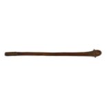 A South Sea Island hardwood war club, with chevron banded engraving beneath the head and