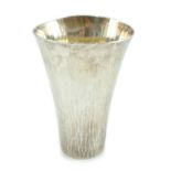 A modern Britannia standard planished silver cup, by Malcolm Appleby, of flared form, with