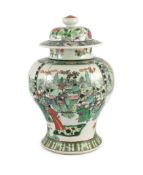A Chinese famille verte jar and associated cover, 19th century, painted with an imperial court