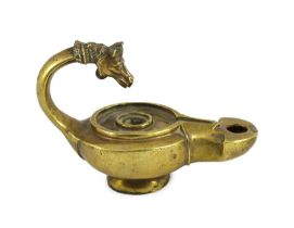 A Renaissance or Roman bronze oil lamp, the high looped handle with horse head finial, 17.5cm
