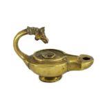 A Renaissance or Roman bronze oil lamp, the high looped handle with horse head finial, 17.5cm