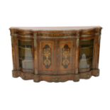 A Victorian marquetry inlaid walnut serpentine credenza, with ormolu mounts and floral marquetry