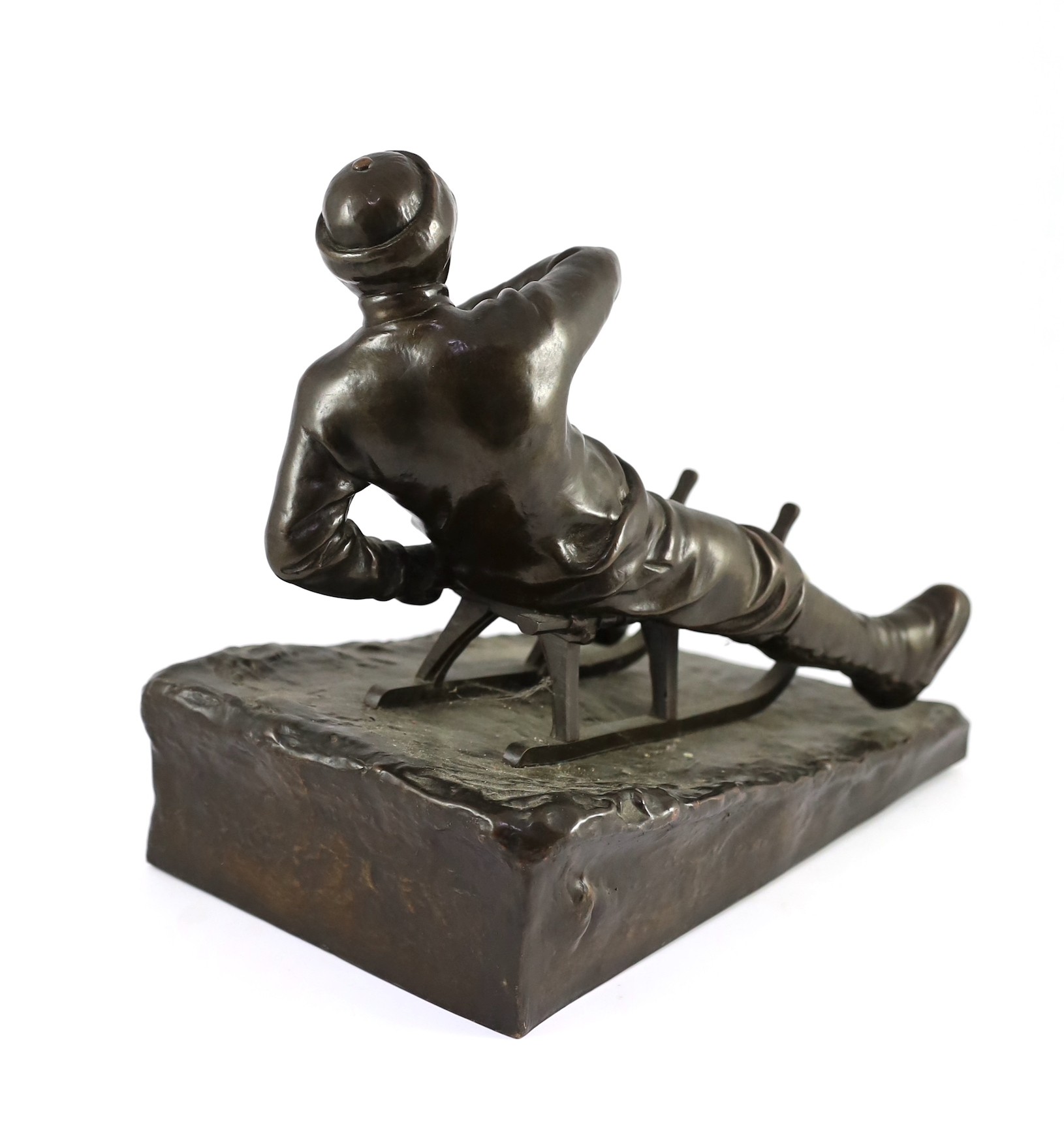 A late 19th / early 20th century German bronze model of a tobogganist, on naturalistic base, - Image 6 of 6