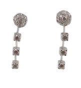 A modern pair of 18ct white gold, diamond cluster and three stone diamond drop set earrings, 28mm,