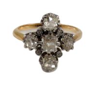 A gold and old cut five stone diamond set 'cross' ring, with diamond chip set spacers, size O, gross