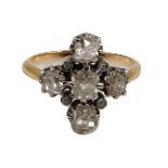 A gold and old cut five stone diamond set 'cross' ring, with diamond chip set spacers, size O, gross