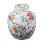 A Chinese famille rose jar and cover, 19th century, painted with peonies, other flowers, rockwork