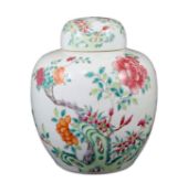 A Chinese famille rose jar and cover, 19th century, painted with peonies, other flowers, rockwork