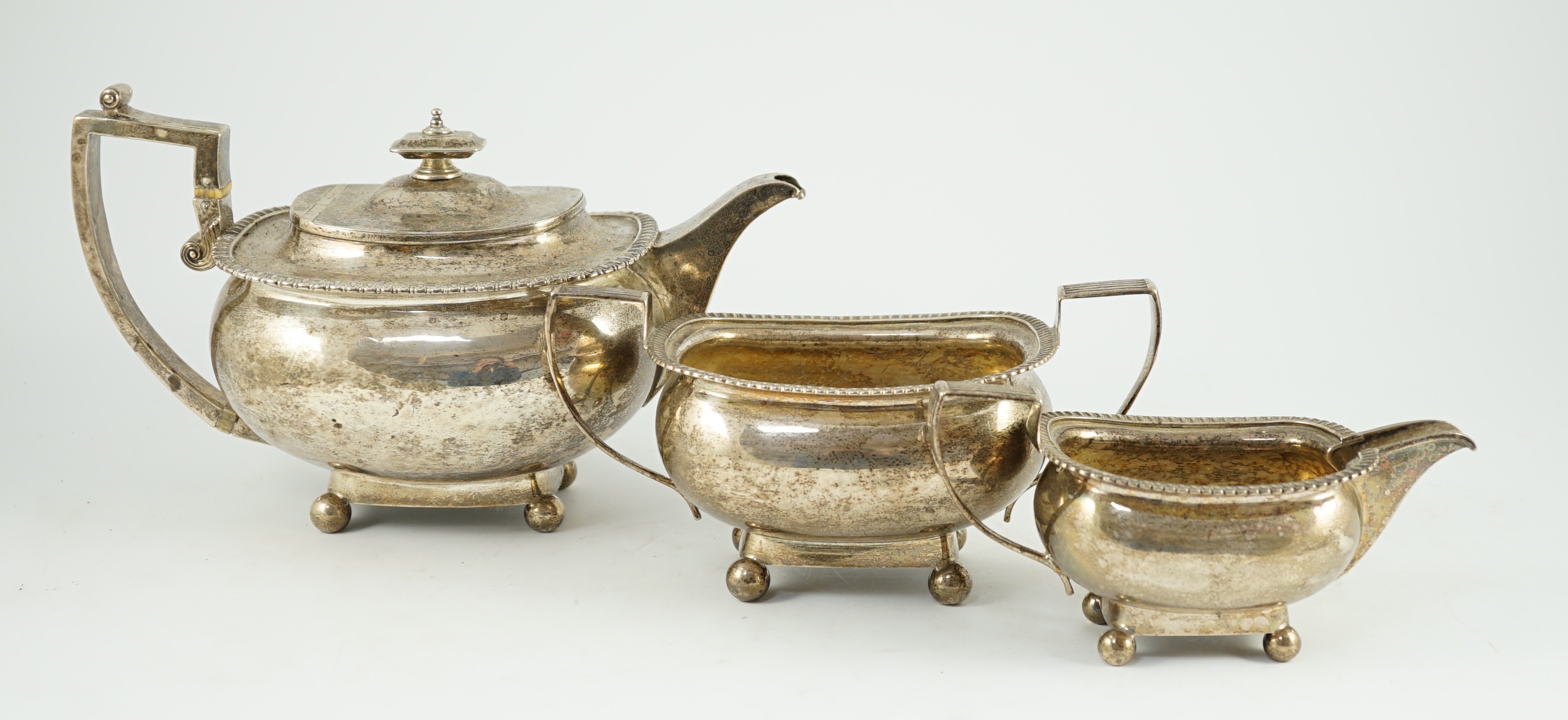 A George III silver three piece 'London' shape tea service, by Samuel Hennell, London, 1811, gross - Image 3 of 7