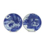 A pair of Chinese blue and white small dishes, Kangxi six character marks and of the period (1662-