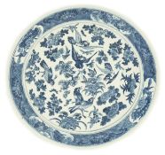 A Chinese blue and white 'blackbird' dish, 19th century, painted with blackbirds amid floral sprays,
