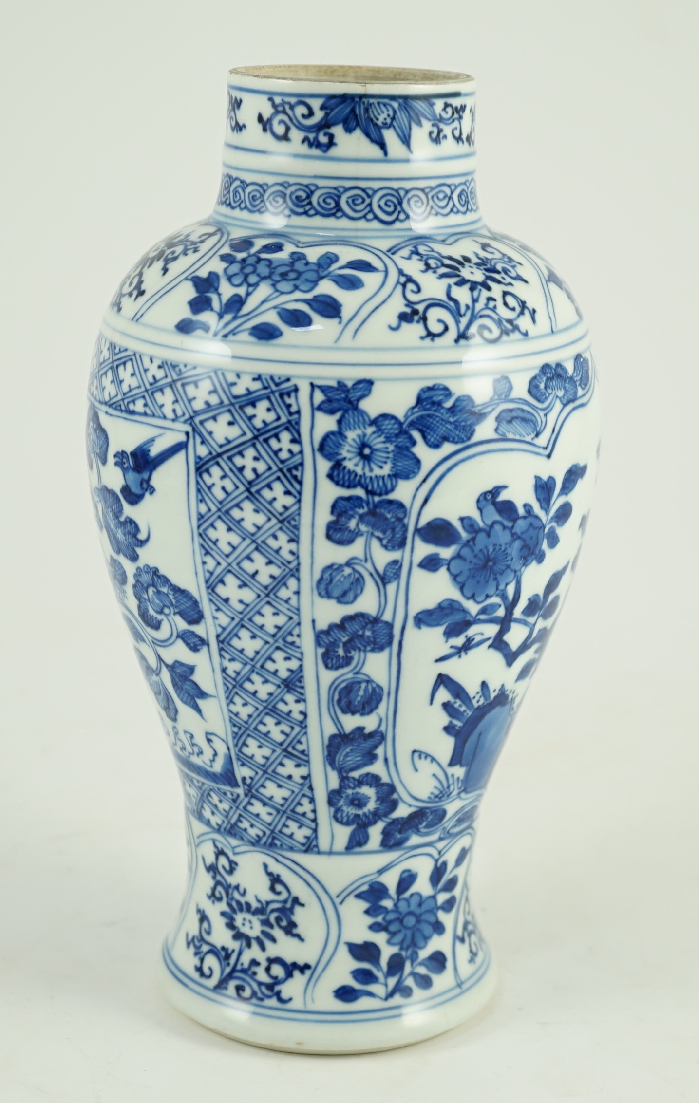 A Chinese blue and white vase, Kangxi period, painted with birds amid flowers and rockwork, within - Image 6 of 9