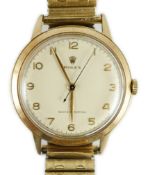 A gentleman's early 1950's 9ct gold Rolex Shock-Resisting manual wind wrist watch, on associated