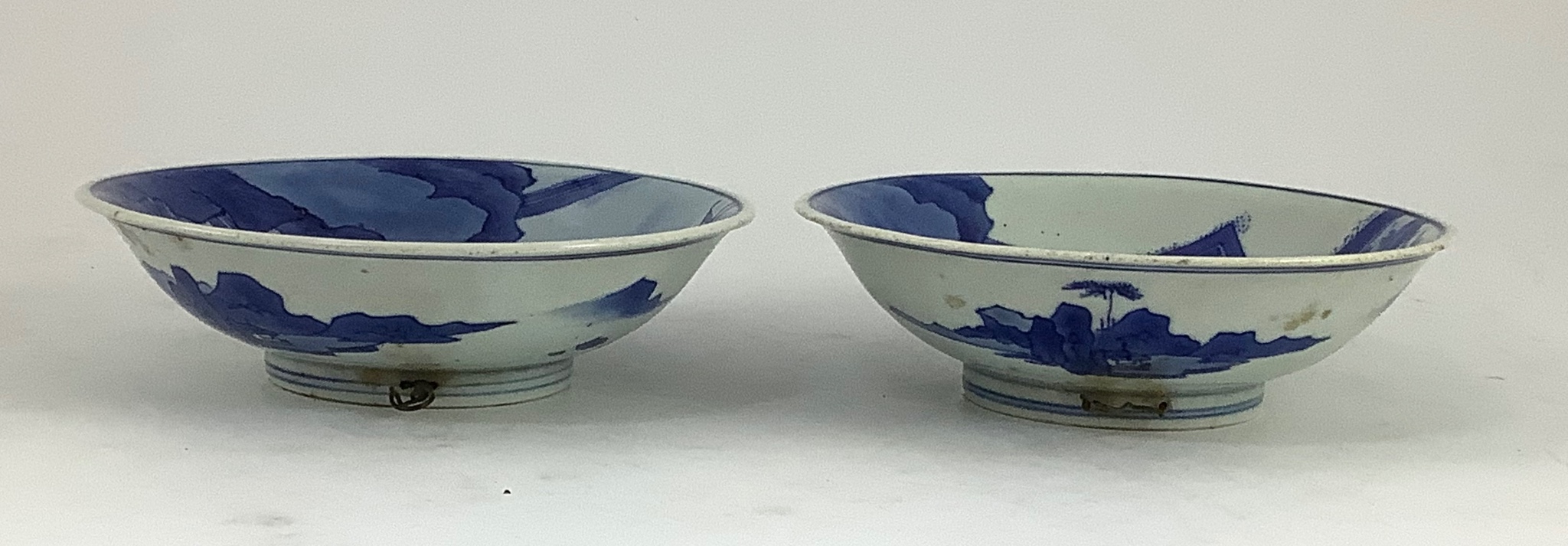 A pair of Chinese blue and white small dishes, Kangxi six character marks and of the period (1662- - Image 4 of 4