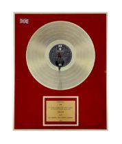 Sgt. Peppers Lonely Hearts Club Band, a framed gold disc, presented to EMI to recognise sales in the