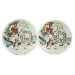Two Chinese famille rose fencai saucer dishes, Yongzheng marks but 19th century, both painted with
