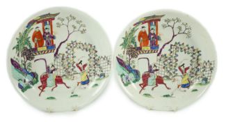 Two Chinese famille rose fencai saucer dishes, Yongzheng marks but 19th century, both painted with
