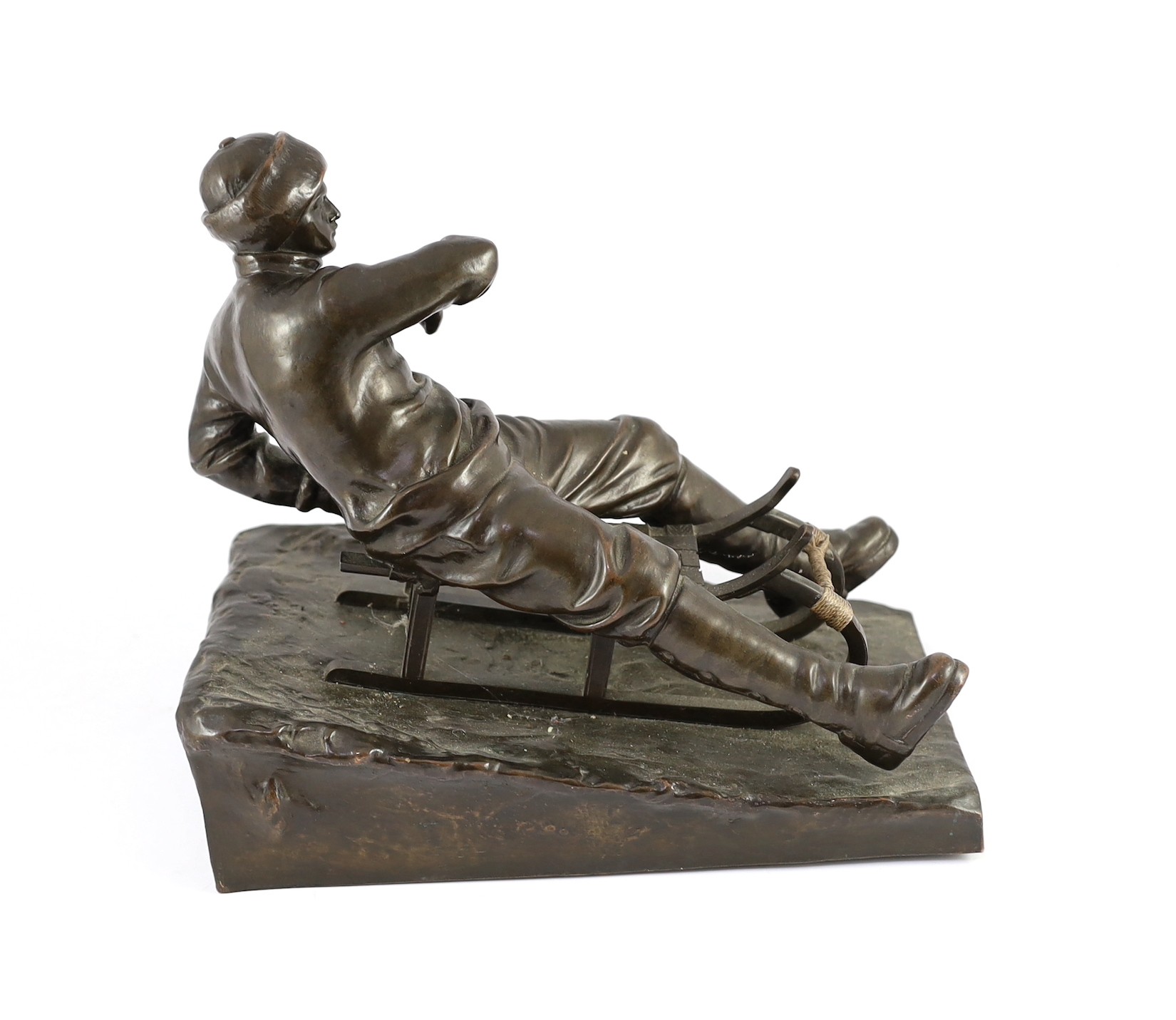 A late 19th / early 20th century German bronze model of a tobogganist, on naturalistic base, - Image 5 of 6