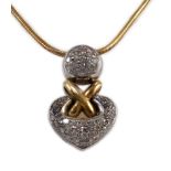 A cased modern Italian 18ct two colour gold and pave set diamond heart shaped pendant by Chimento,