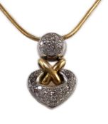 A cased modern Italian 18ct two colour gold and pave set diamond heart shaped pendant by Chimento,