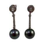 A modern pair of single stone South Sea Tahitian pearl style and diamond chip set drop earrings,
