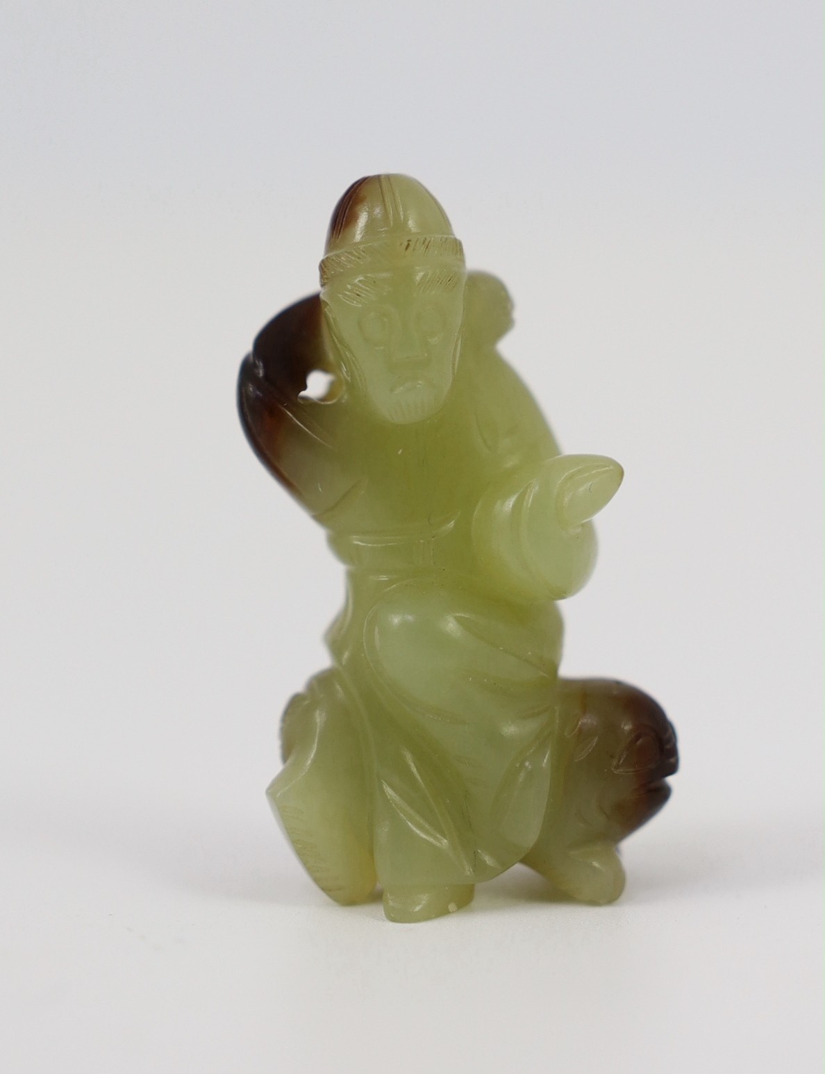 A Chinese yellow and brown jade figure of a man seated on a creature, 19th century, the greenish - Image 6 of 8