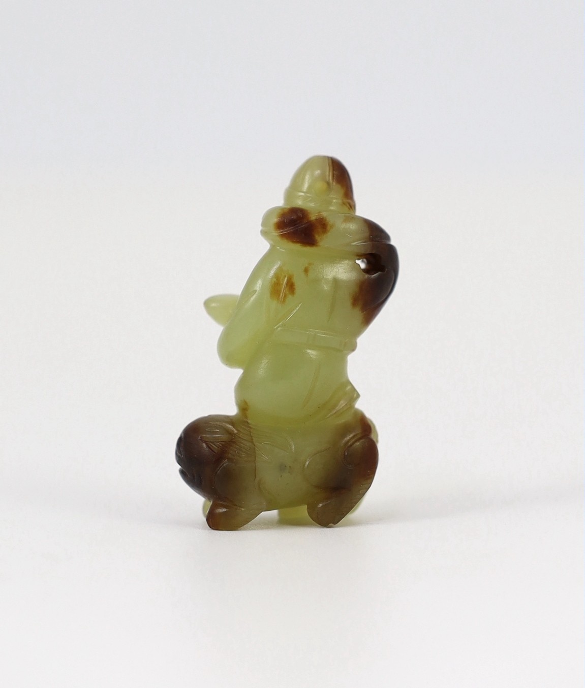 A Chinese yellow and brown jade figure of a man seated on a creature, 19th century, the greenish - Image 7 of 8