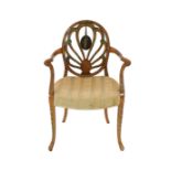 A late Victorian Sheraton revival painted satinwood elbow chair, with anthemion and cameo back and