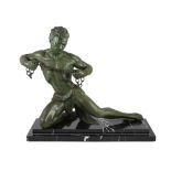 Jean De Roncourt. A French Art Deco bronze 'Hercule brisant ses chaînes', on stepped marble