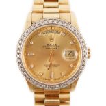 A gentleman's 1980's 18ct gold and diamond set Rolex Oyster Perpetual Day-Date wrist watch, with