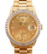 A gentleman's 1980's 18ct gold and diamond set Rolex Oyster Perpetual Day-Date wrist watch, with