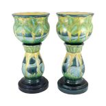 A pair of Burmantofts Art Nouveau faience jardinieres on matching pedestals, c.1900, impressed marks
