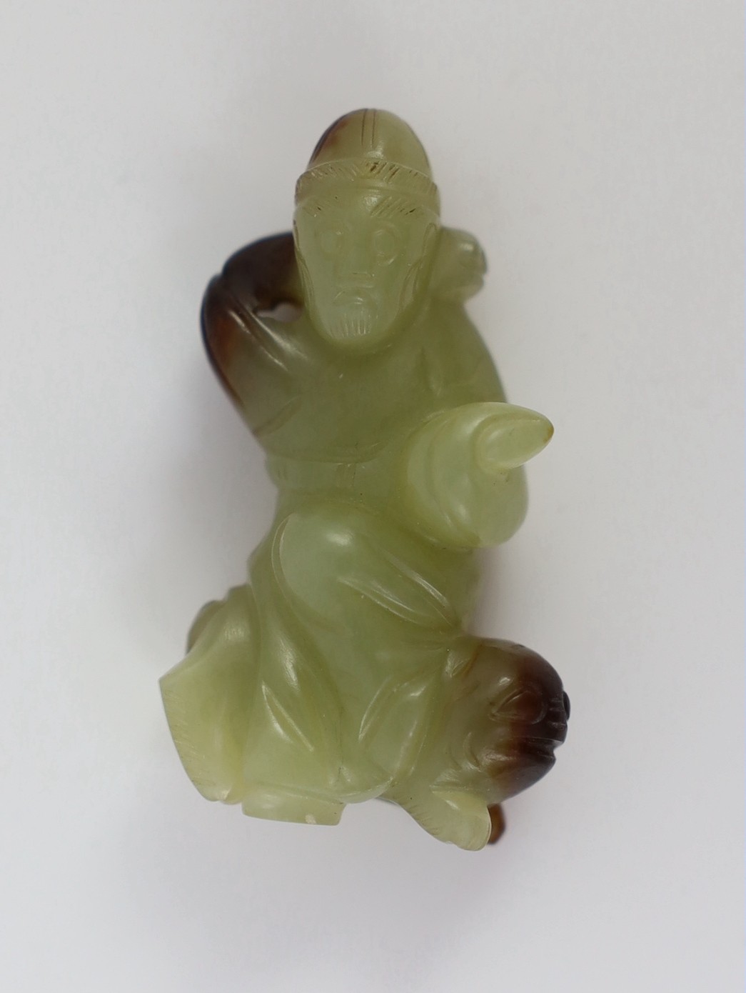 A Chinese yellow and brown jade figure of a man seated on a creature, 19th century, the greenish - Image 3 of 8