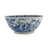 A large Chinese blue and white bowl, 19th century, the interior painted with a bird amid flowers