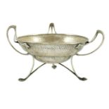 An Edwardian Art Nouveau planished silver tri-handled bowl by The Alexander Clark Manufacturing Co.,