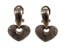 A modern pair of Italian 18ct white gold and pave set diamond heart shaped earrings, by Chimento,