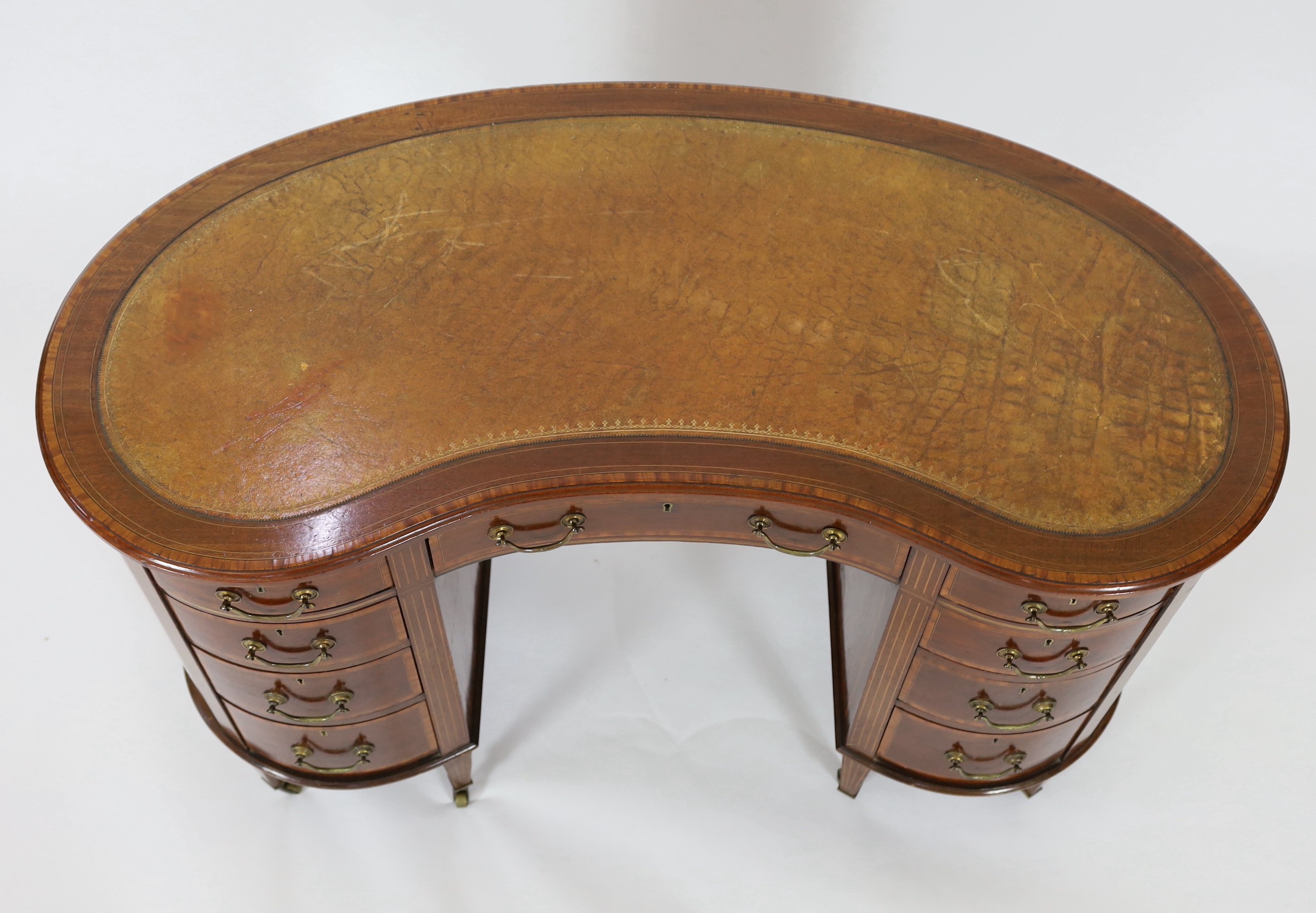 An Edwardian satinwood banded mahogany kidney shaped kneehole desk, with brown skiver and - Image 2 of 5
