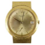 A gentleman's late 20th century 18ct gold Patek Philippe automatic dress wrist watch, on integral