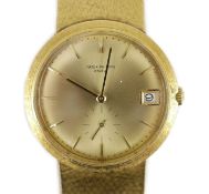 A gentleman's late 20th century 18ct gold Patek Philippe automatic dress wrist watch, on integral