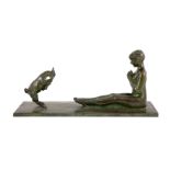 After Paul Silvestre (French, 1884-1976). A patinated Art Deco bronze group of a Bacchante and faun,