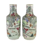 A pair of Chinese famille rose fencai inscribed vases, mid 19th century, each well painted with