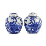 A pair of Chinese blue and white jars and covers, 19th century, each painted with pheasants amid